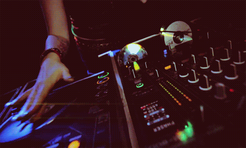 DJ playing on a turntable