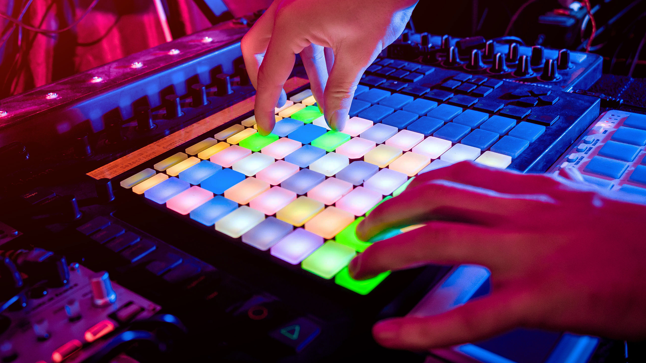 Sound engineer working at mixing panel in the in sound recording studio.